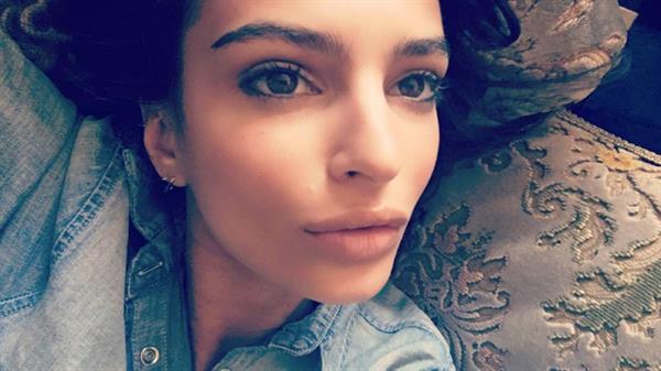 Emily Ratajkowski taking a selfie