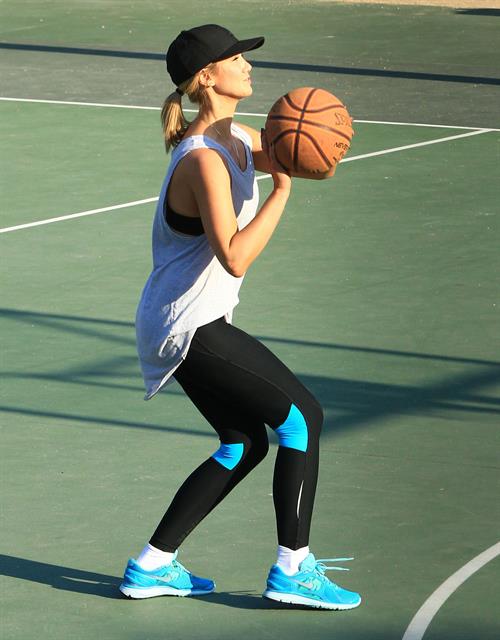 Delta Goodrem playing basketball with a friend in Los Angeles, California on November 3, 2013 