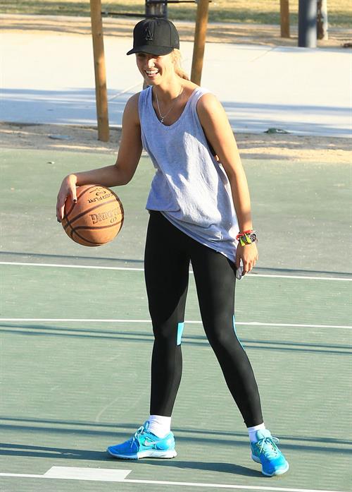 Delta Goodrem playing basketball with a friend in Los Angeles, California on November 3, 2013 