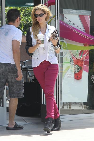 Delta Goodrem - Stopping to get a coffee on her way to work in Los Angeles, California - July 18, 2012