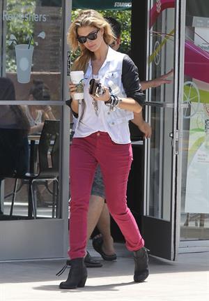 Delta Goodrem - Stopping to get a coffee on her way to work in Los Angeles, California - July 18, 2012