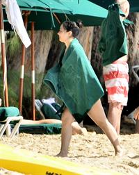 Demi Lovato and her bodyguard are spotted on the beach in Barbados April, 16 2013 