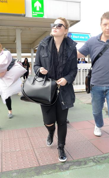 Demi Lovato - Leaves London Heathrow Airport in London (01.06.2013) 