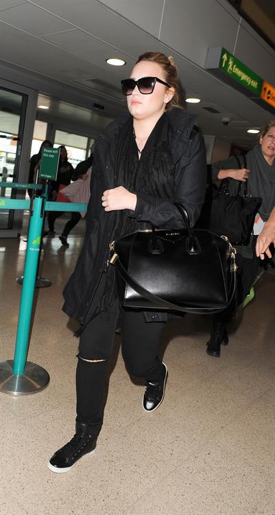Demi Lovato - Leaves London Heathrow Airport in London (01.06.2013) 
