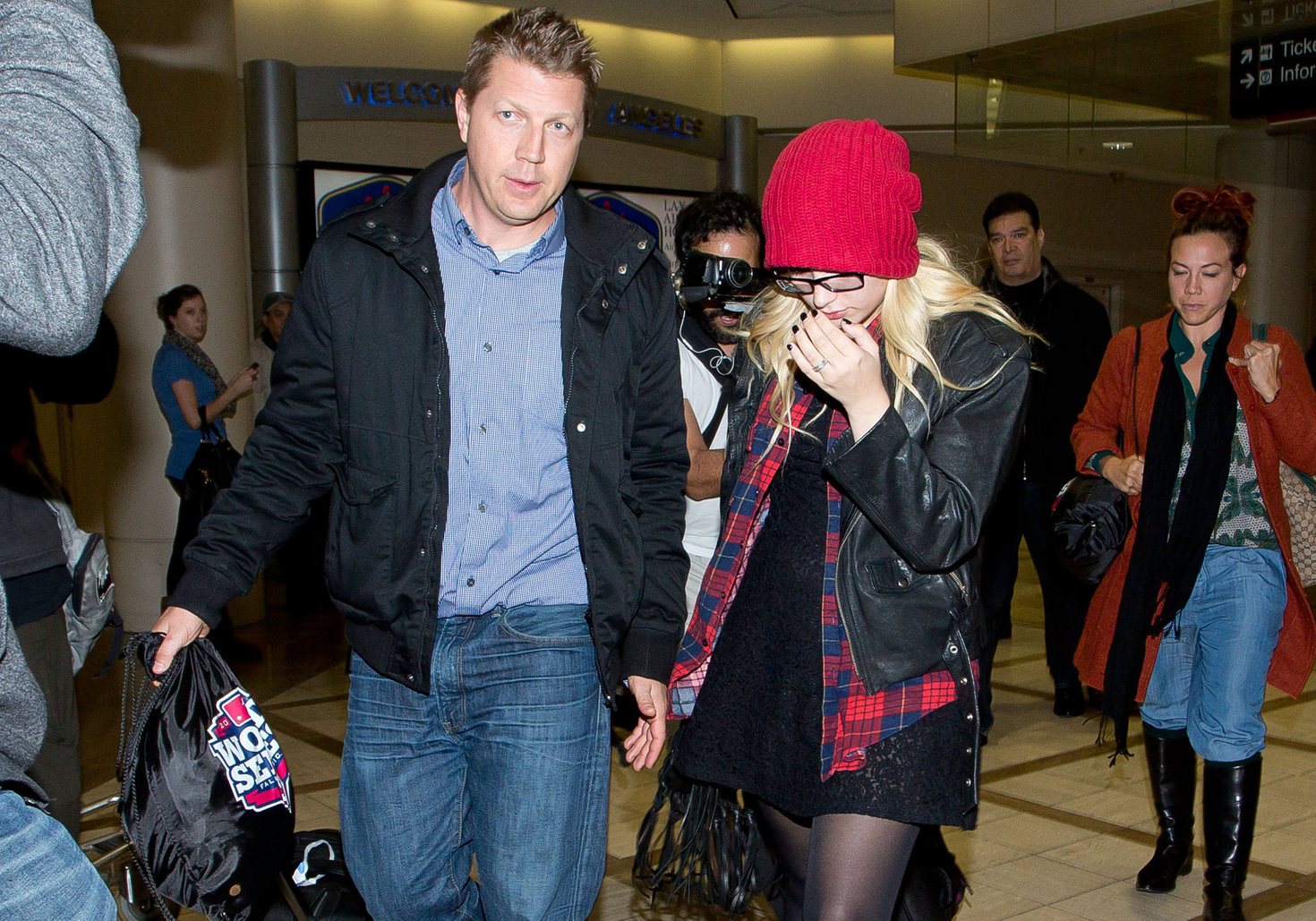 Demi Lovato cute in a red touque & specs @ LA/28/12