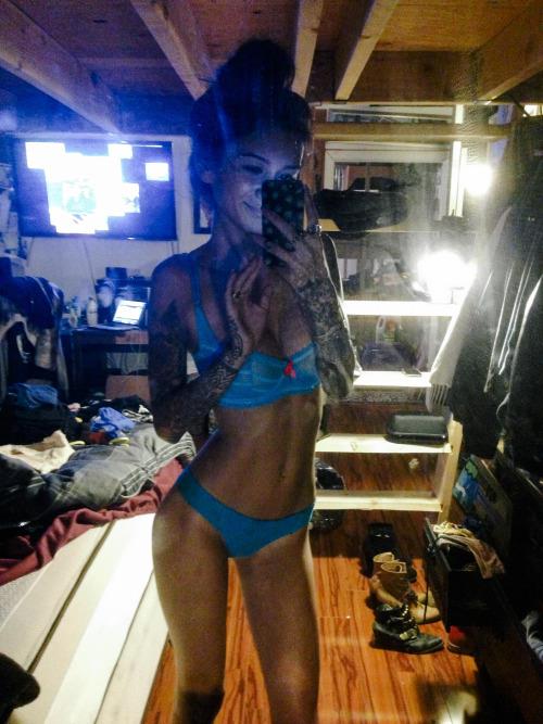 Jenah Yamamoto in a bikini taking a selfie