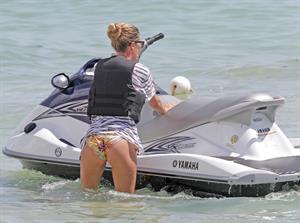 Doutzen Kroes bikini beach pictures in Miami August 16, 2012