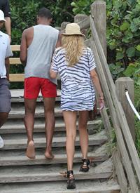 Doutzen Kroes bikini beach pictures in Miami August 16, 2012