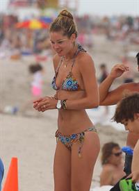 Doutzen Kroes bikini candids on the beach in Miami, Florida Augusts 15, 2012