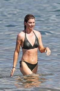 Ellen Pompeo - Wearing a sexy wet bikini on a beach in Maui (June 6, 2012)