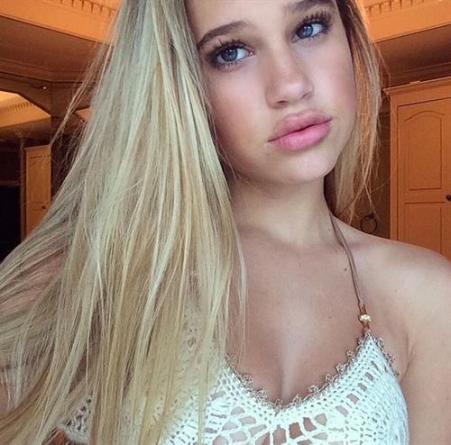 Meredith Mickelson taking a selfie