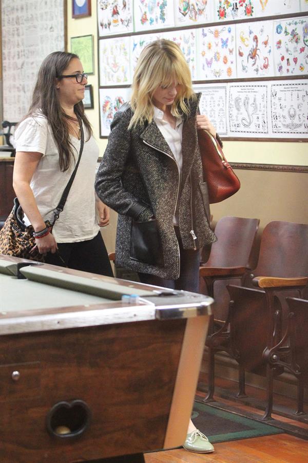 Emma Stone Stopped at Shamrock Tattoo - October 17, 2012 