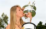 Victoria Azarenka poses with Memorial Cup after winning the 2013 Australian Open January 27, 2013 