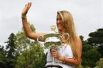 Victoria Azarenka poses with Memorial Cup after winning the 2013 Australian Open January 27, 2013 