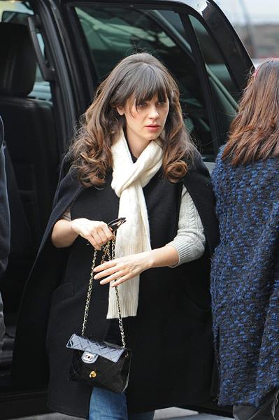 Zooey Deschanel seen out in SoHo holding a Chanel purse. November 16, 2012 