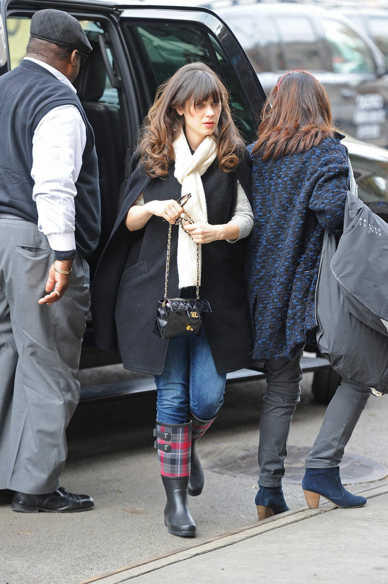Zooey Deschanel seen out in SoHo holding a Chanel purse. November 16, 2012 