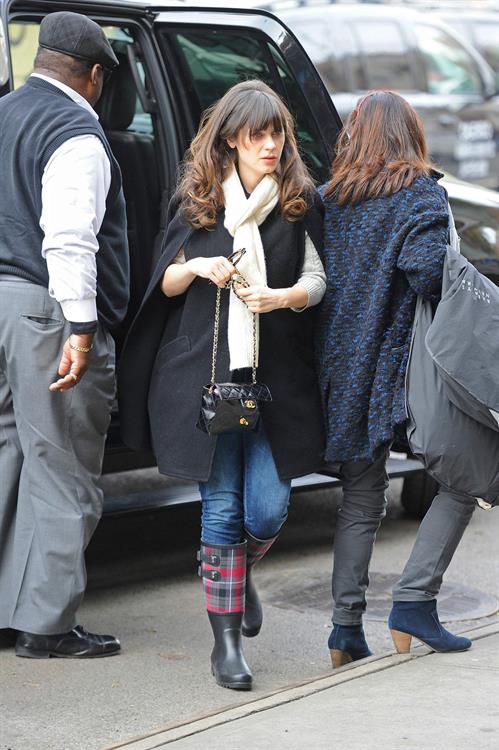 Zooey Deschanel Pictures Zooey Deschanel seen out in SoHo holding a Chanel purse. November 16, 2012