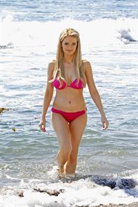 Holly Madison - In a pink bikini at Laguna Beach in California Sept 6, 2012