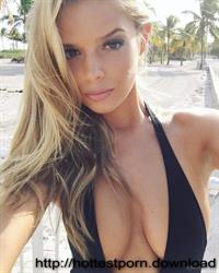 Danielle Knudson in a bikini taking a selfie