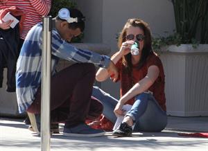 Jessica Stroup takes a break on the set of 90210 in Los Angeles on February 26, 2013
