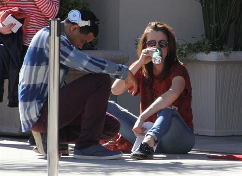 Jessica Stroup takes a break on the set of 90210 in Los Angeles on February 26, 2013