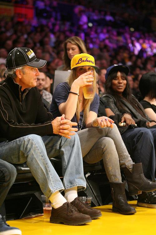 Kaley Cuoco attending a Los Angeles Lakers vs New York Knicks basketball game in LA on December 29, 2011