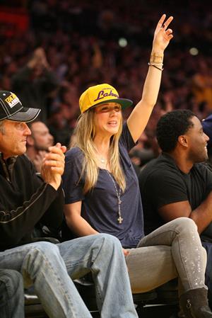 Kaley Cuoco attending a Los Angeles Lakers vs New York Knicks basketball game in LA on December 29, 2011