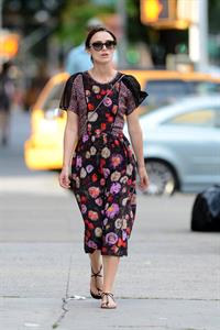 Keira Knightley wears a dark floral dress while strolling in New York City on August 7, 2012