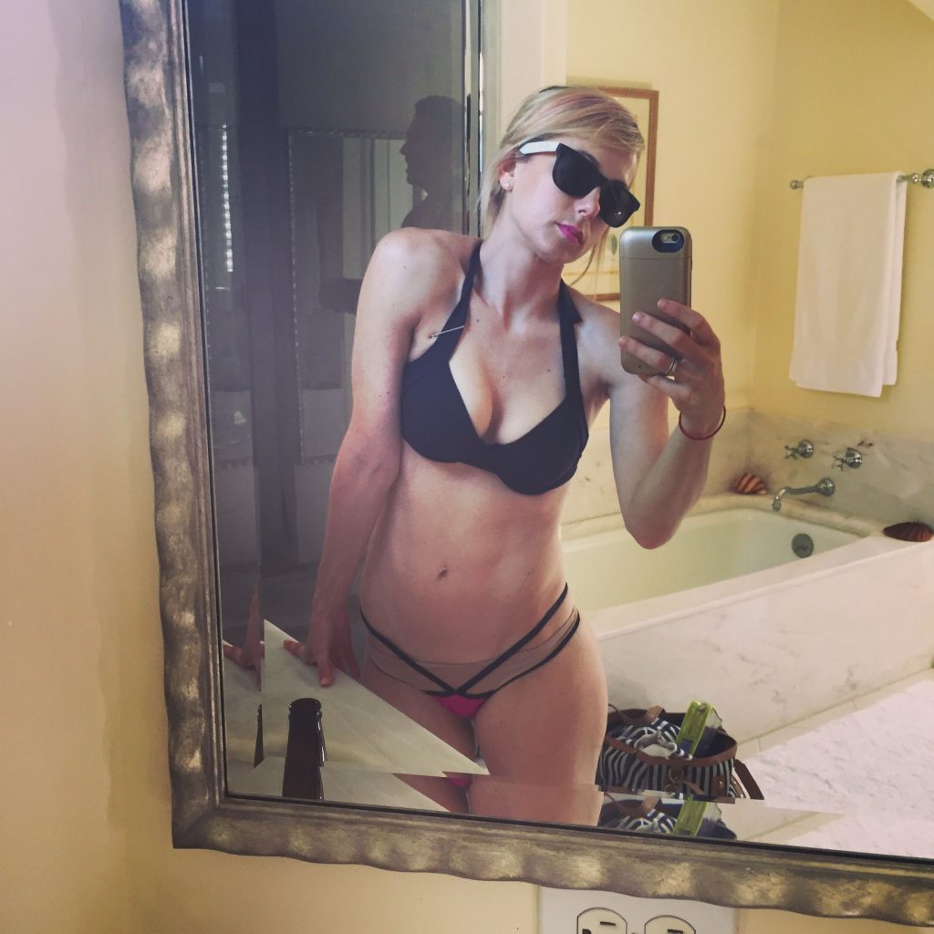 Iliza Shlesinger in a bikini taking a selfie. 