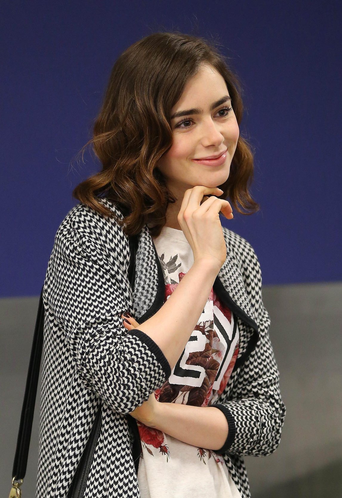 Lily Collins - LAX Airport 8/27/13
