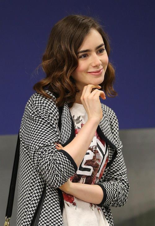 Lily Collins - LAX Airport 8/27/13