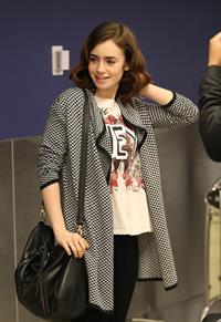 Lily Collins - LAX Airport 8/27/13
