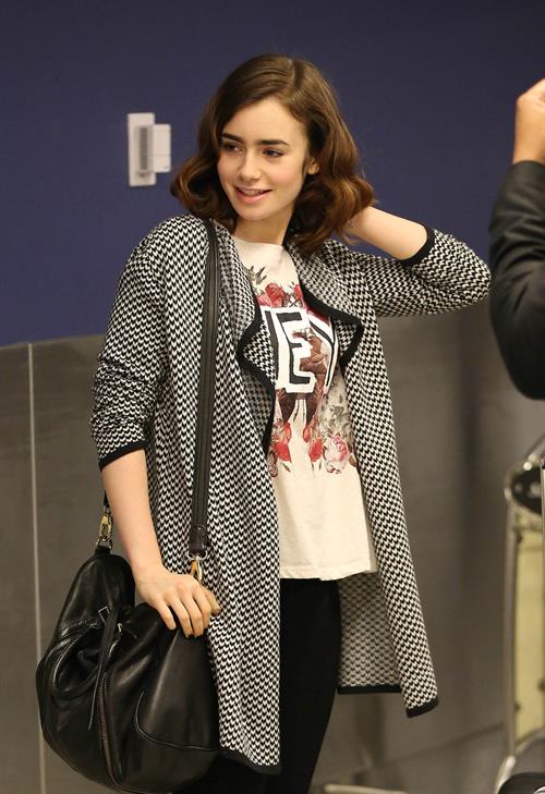 Lily Collins - LAX Airport 8/27/13