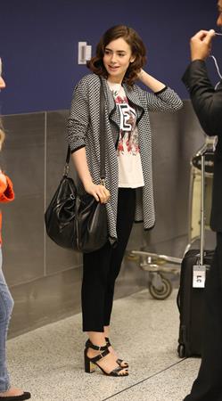 Lily Collins - LAX Airport 8/27/13
