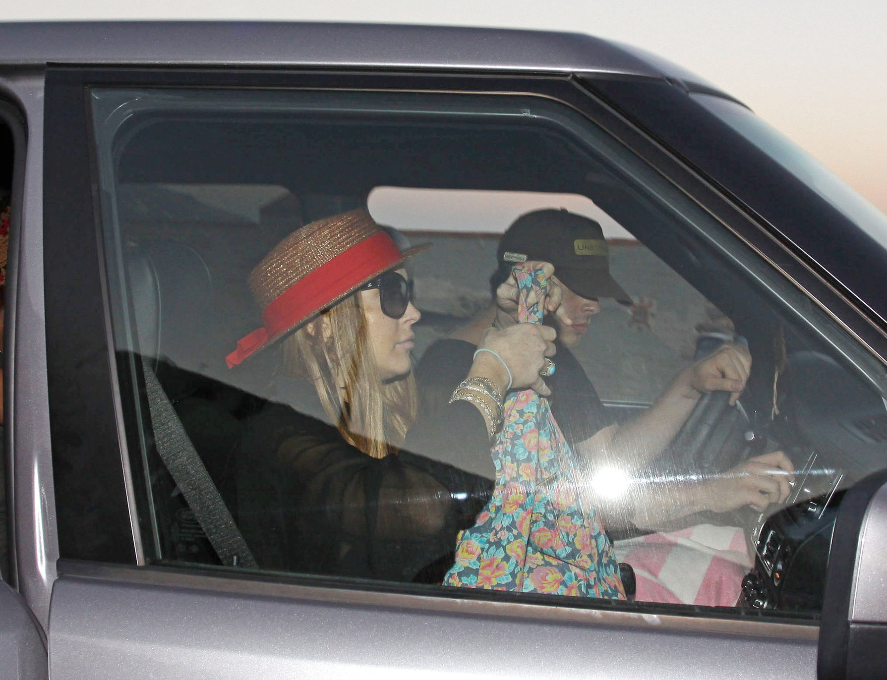 Lindsay Lohan - arriving to the beach in Malibu - August 12, 2012