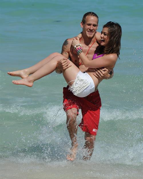 Lucy Hale Bikini Pictures Lucy Hale and Ashley Benson photoshoot at the Bondo Bikini Shack on Miami Beach on March 24, 2012