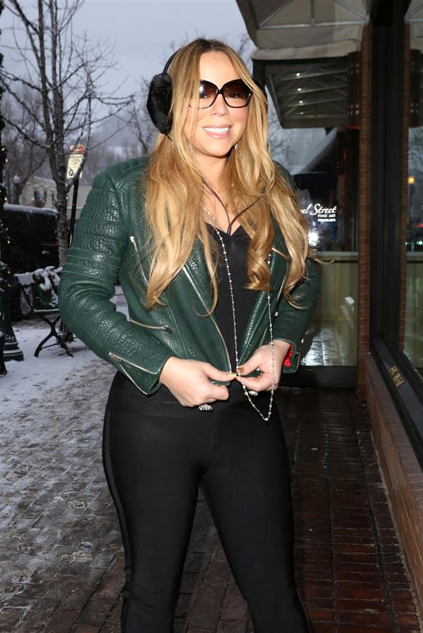 Mariah Carey made another stop at the Louis Vuitton store to shop with a family member. December 24, 2012 