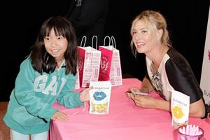Maria Sharapova poses during Maria Sharapova launches her Sugarpova Candy Collection December 13, 2012 