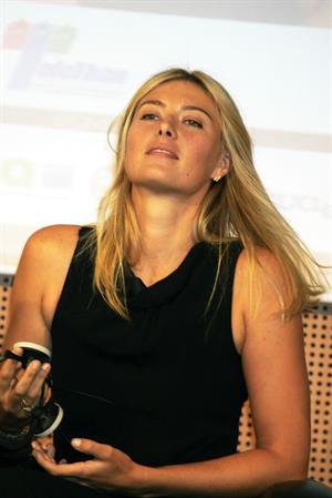 Maria Sharapova attends a press conference to present Saturday's exhibition match Milan November 30, 2012 