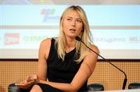 Maria Sharapova attends a press conference to present Saturday's exhibition match Milan November 30, 2012 