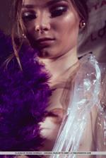 Claudia wraps her sexy, tight body on plastic as she plays with her pussy.