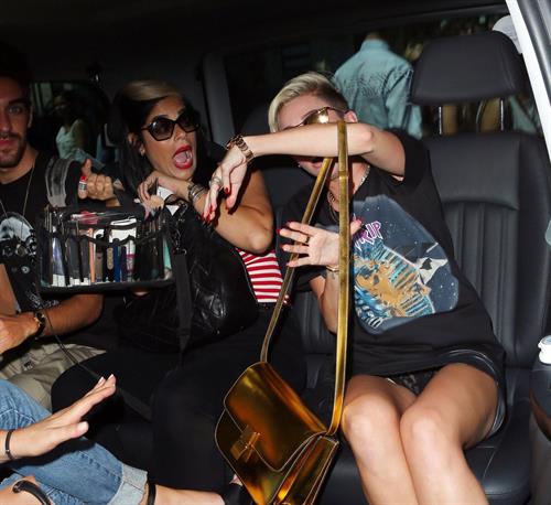 Miley Cyrus Spotted in a Join A Weird Trip T-shirt outside the London Studios in London (18.07.2013) 