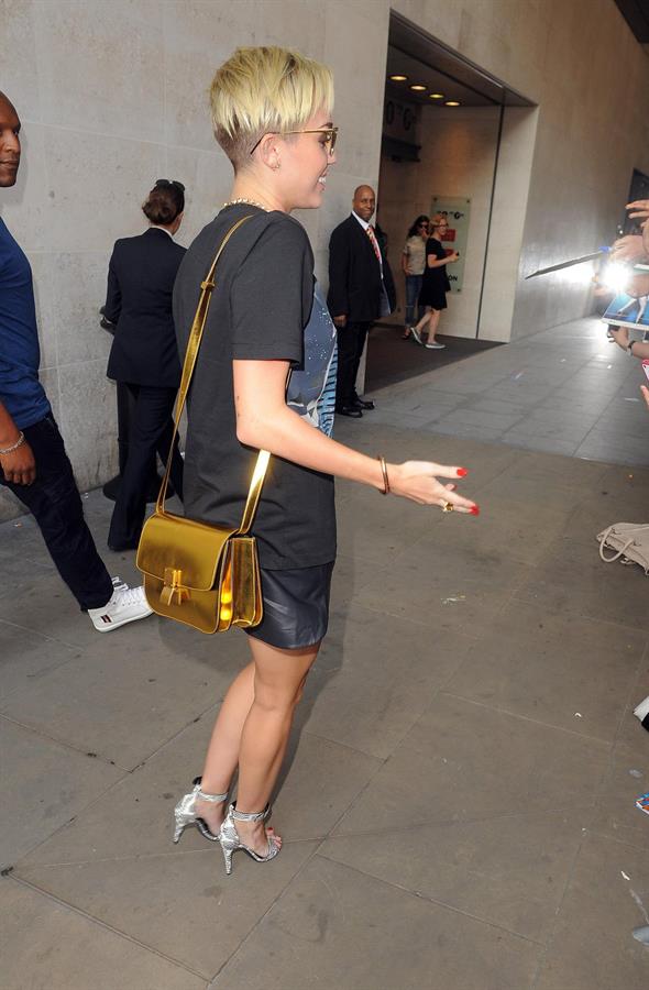 Miley Cyrus Spotted in a Join A Weird Trip T-shirt outside the London Studios in London (18.07.2013) 