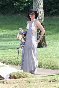 Milla Jovovich on the beach in a bikini on New Years Eve in Maui, Hawaii December 31, 2012 