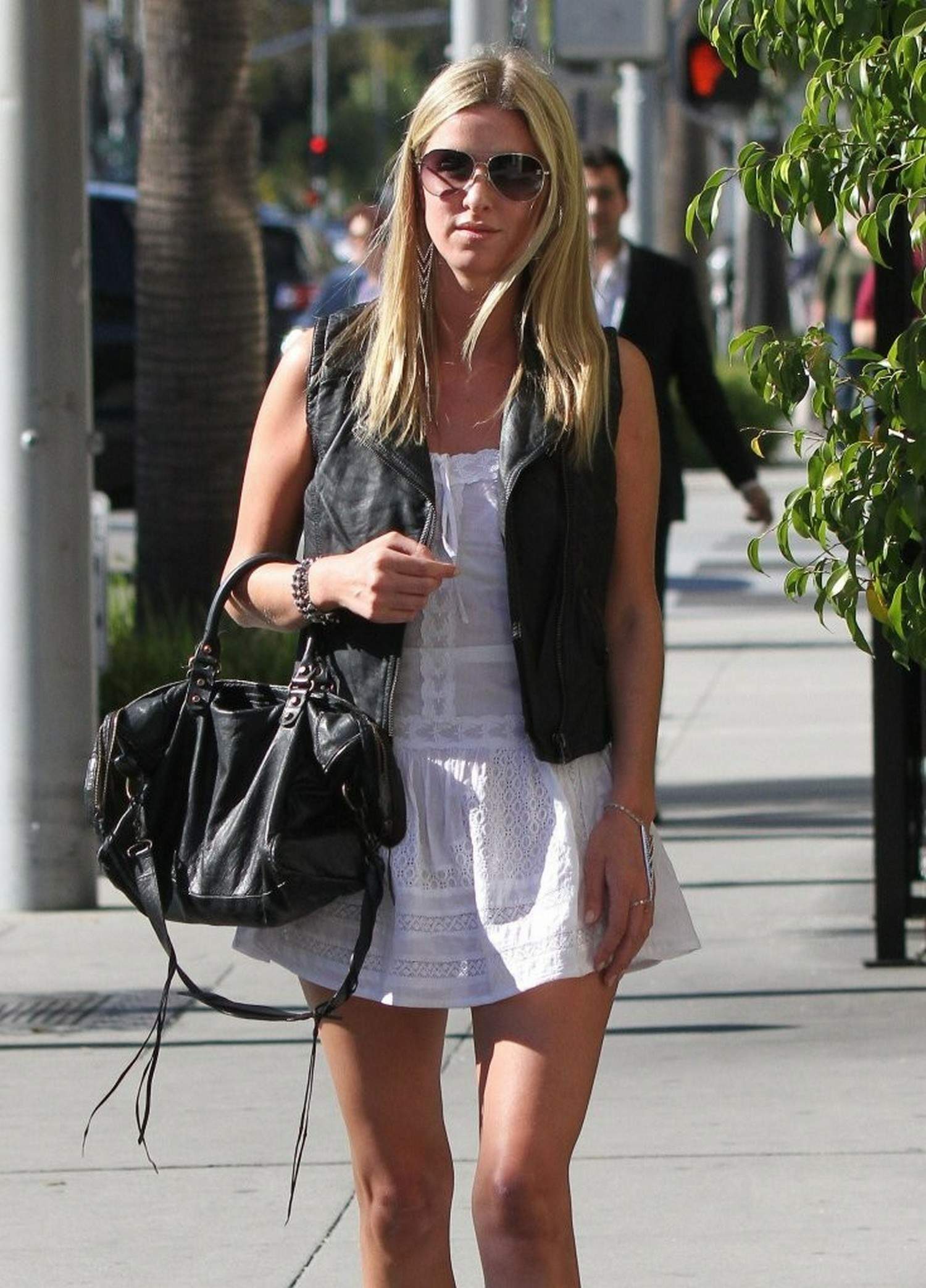 Nicky Hilton in a short white dress while shopping in Beverly Hills March 1, 2013 
