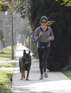 Nikki Reed jogging with her dog Enzo in Los Angeles on February 6, 2013