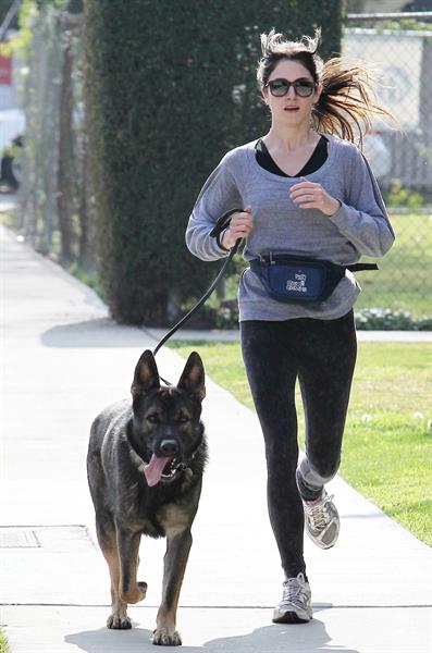 Nikki Reed jogging with her dog Enzo in Los Angeles on February 6, 2013