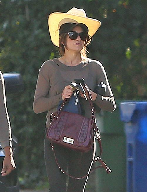 Nikki Reed walking and wearing her cowboy hat in Los Angeles on February 21, 2013
