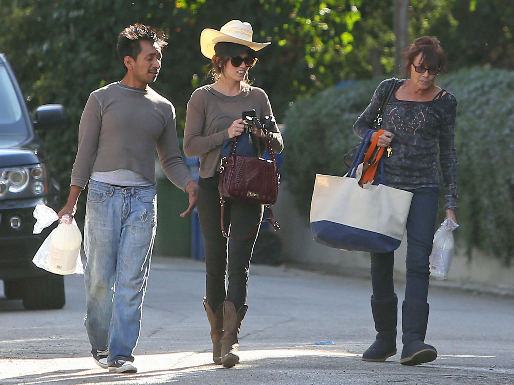Nikki Reed walking and wearing her cowboy hat in Los Angeles on February 21, 2013