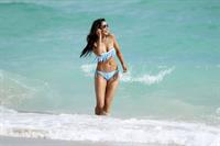 Padma Lakshmi in a bikini on the beach in Miami, Florida - December 8, 2012 